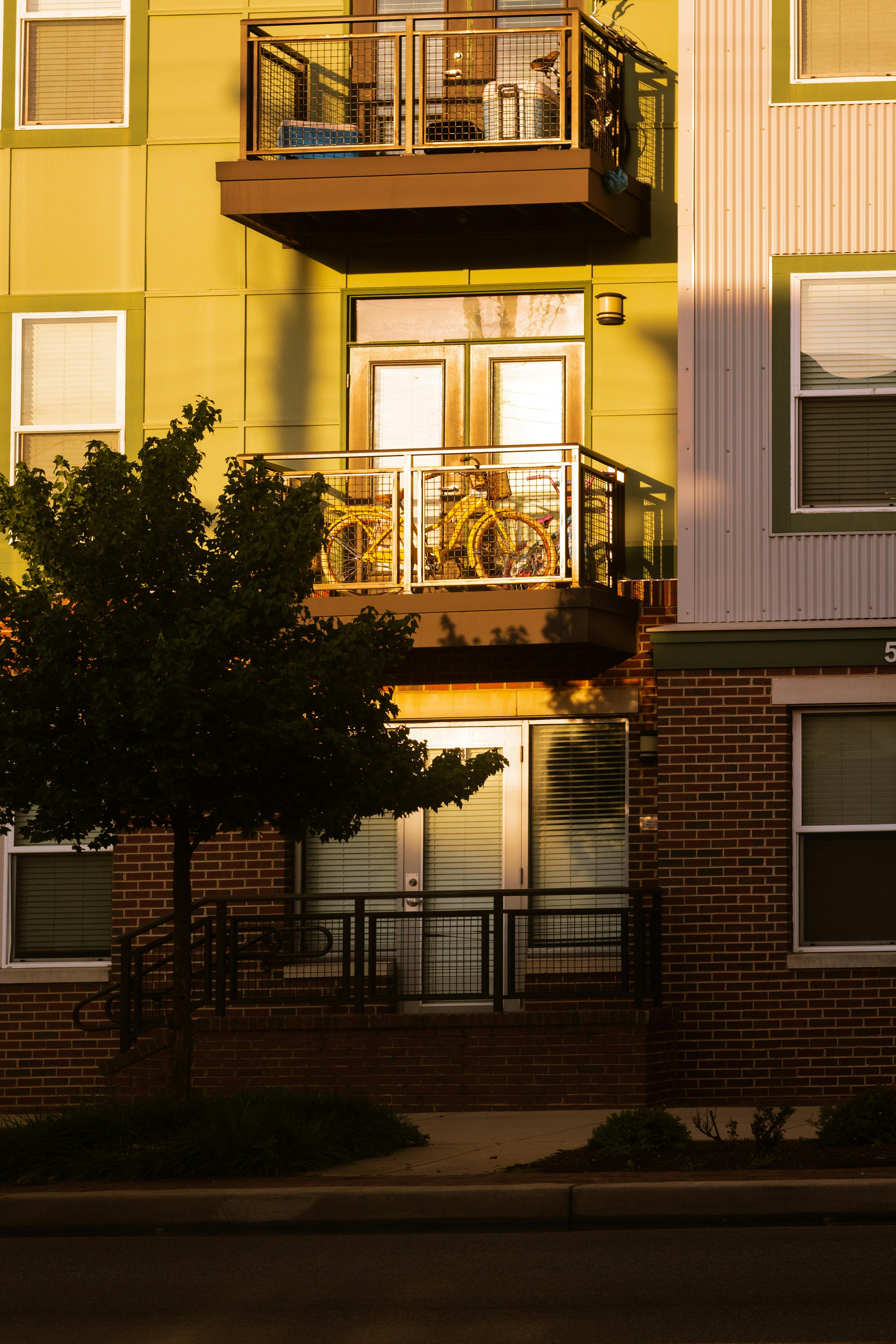 Modern multifamily apartment building with contemporary design and balconies